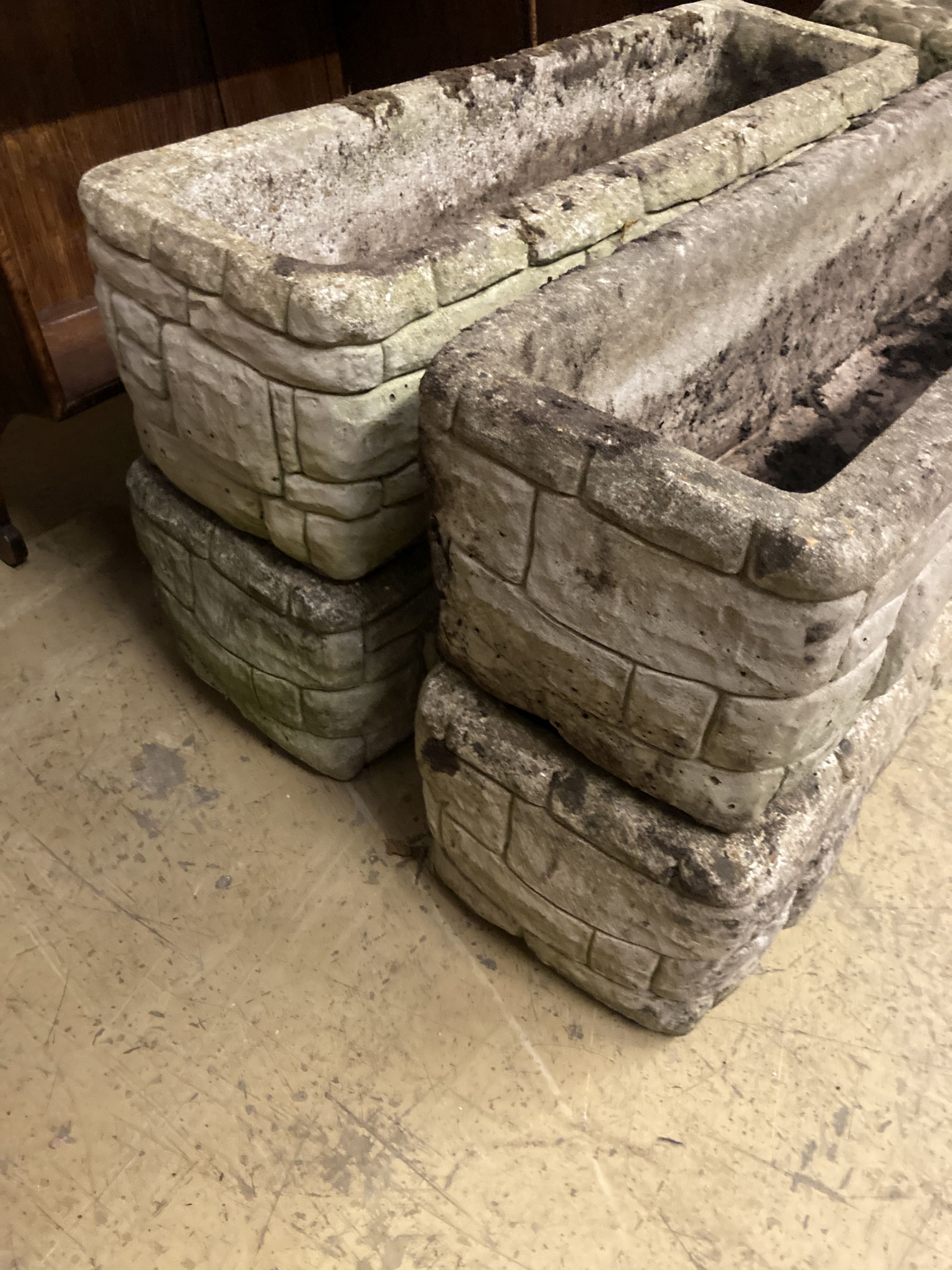 A set of four rectangular brick effect reconstituted stone garden troughs, width 60cm, depth 20cm, height 17cm